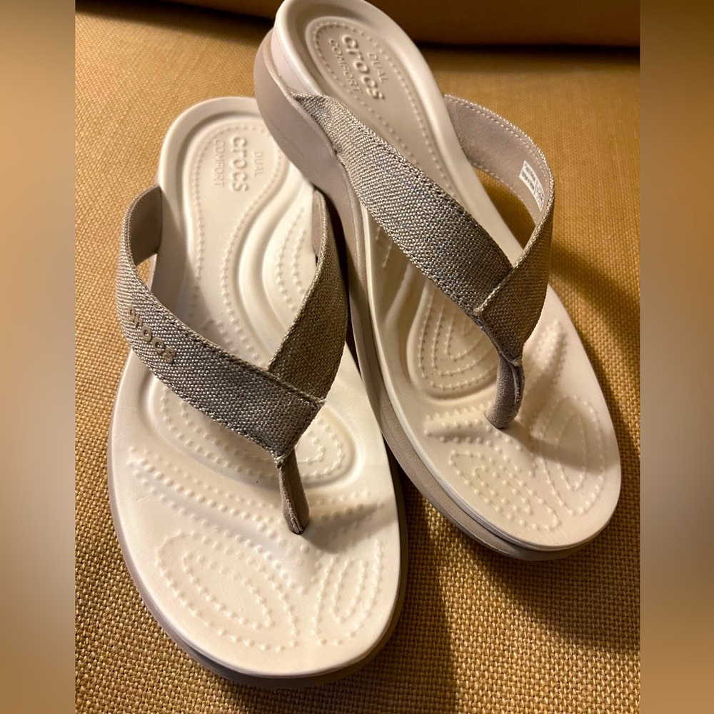Crocs gold flip flops size 6